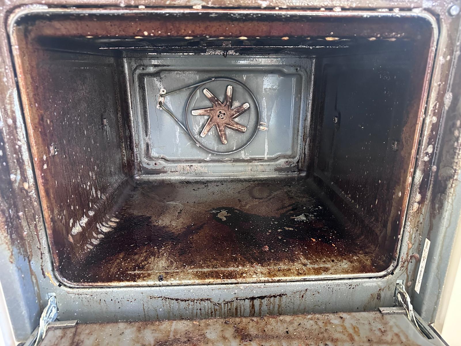 Oven detail before cleaning in Southam
