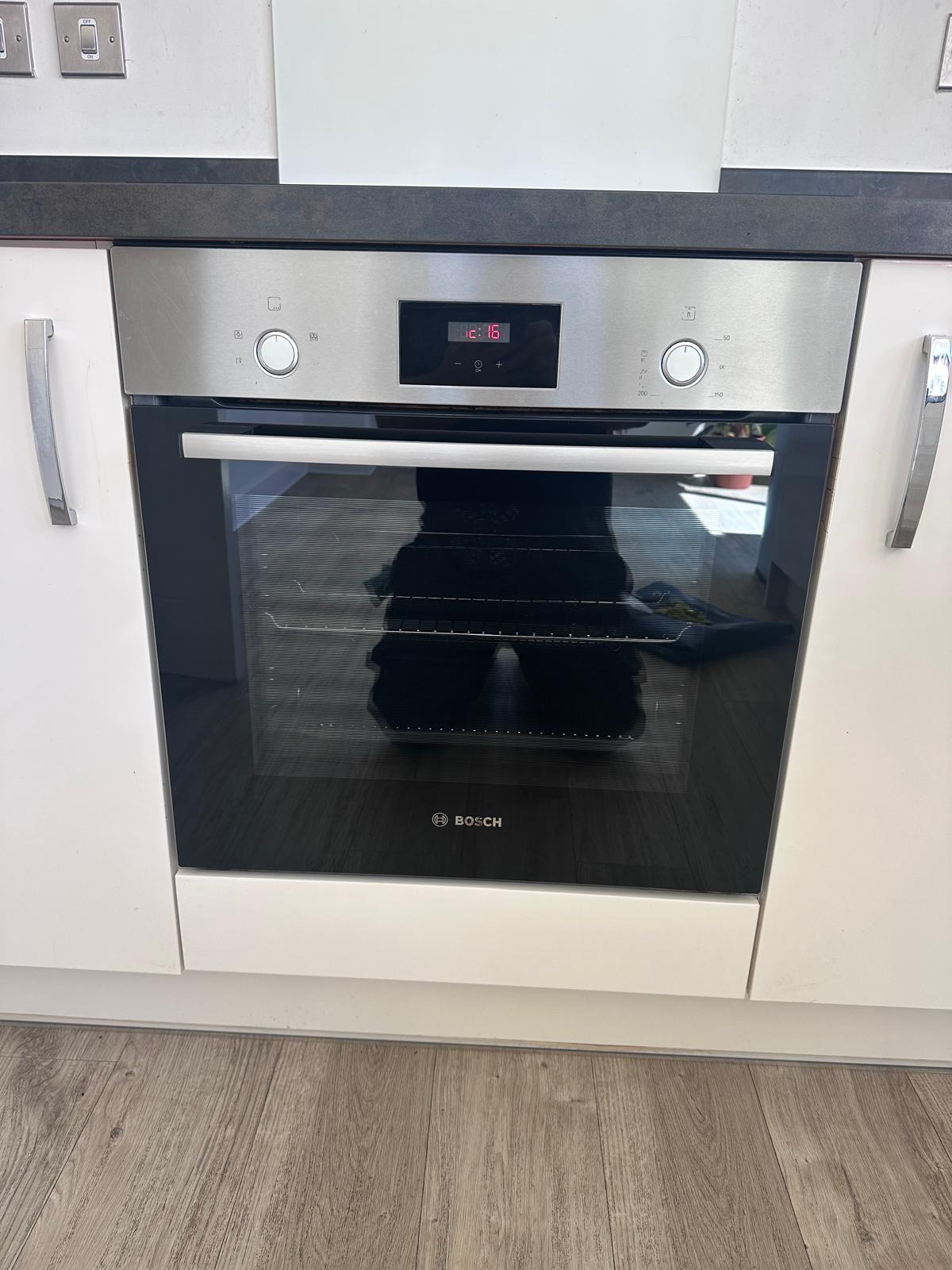 Oven shelves after cleaning in Southam