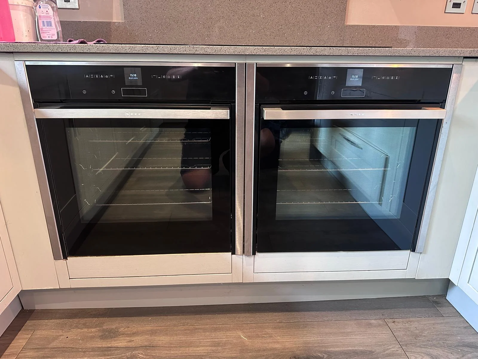 Two closed NEFF Slide&Hide ovens after cleaning in Hereford